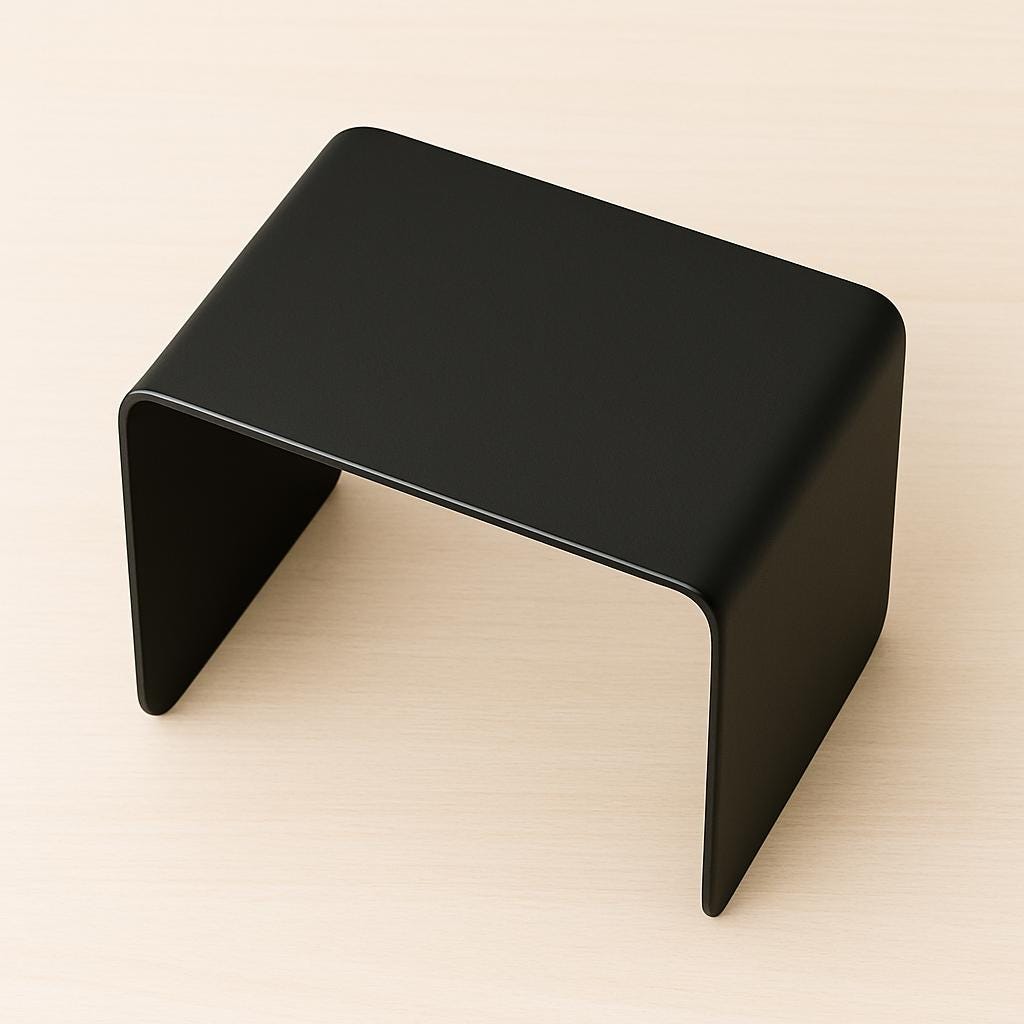 Minimalistyczny metalowy stolik kawowy